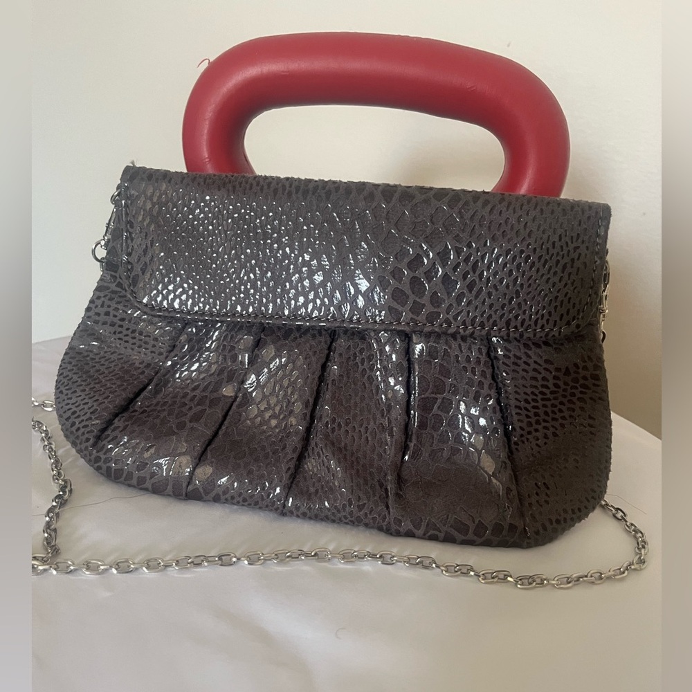 Women’s grey faux snakeskin clutch bag with detachable chain shoulder strap